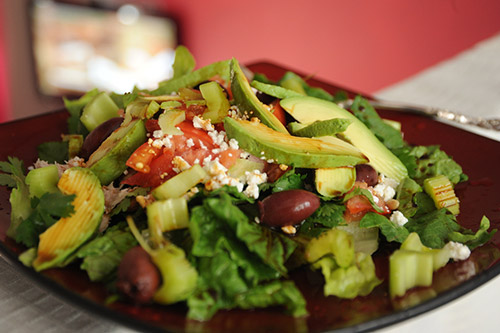 a sasad with avacados and tomatos